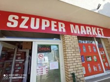 The exterior of a typical small convenience store in Budapest