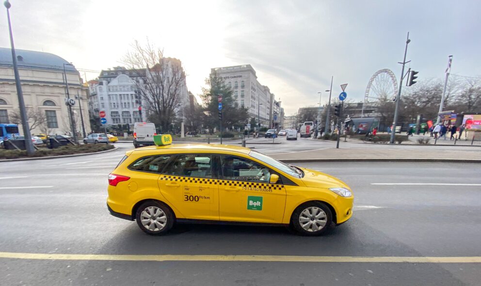 Yellow taxis lined up for passengers at Deák Ferenc Square in downtown Budapest