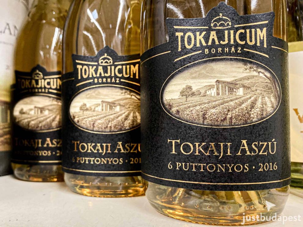 A close-up of a traditional Tokaji Aszu wine bottle label