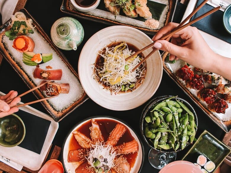 Guests enjoying the lively evening atmosphere inside TOKIO