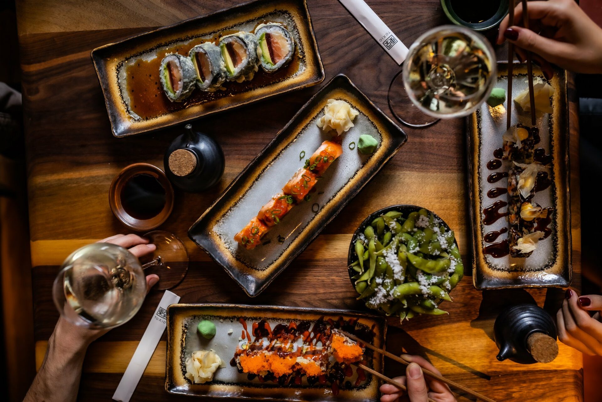 Sushi dishes and wine at TOKIO Asian fusion restaurant and bar in Budapest