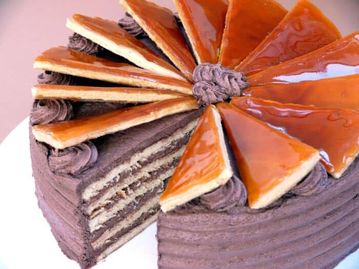 Close-up of a classic Hungarian Dobos Torta with chocolate layers and caramel top