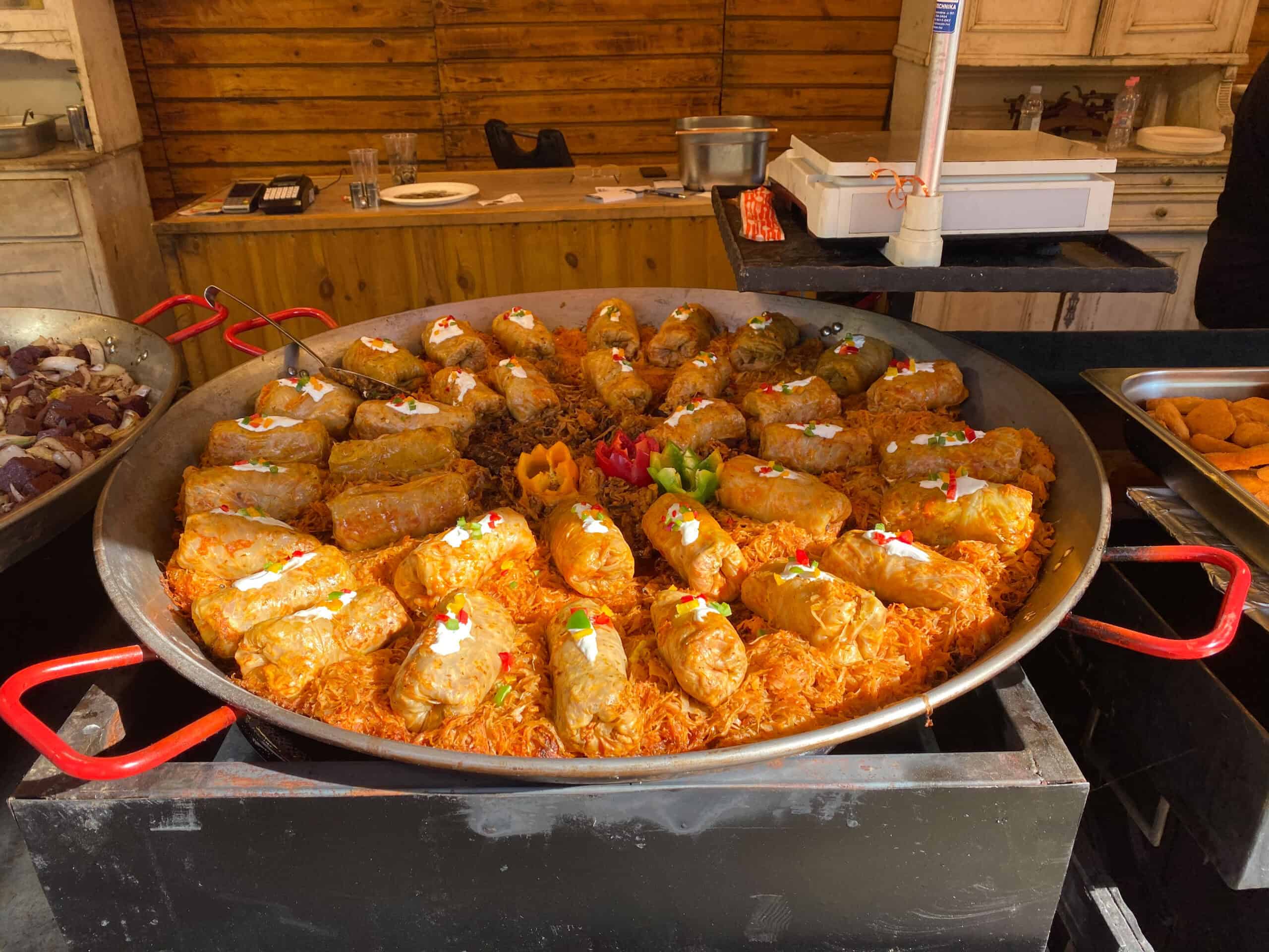 A delicious plate of traditional Hungarian stuffed cabbage topped with sour cream