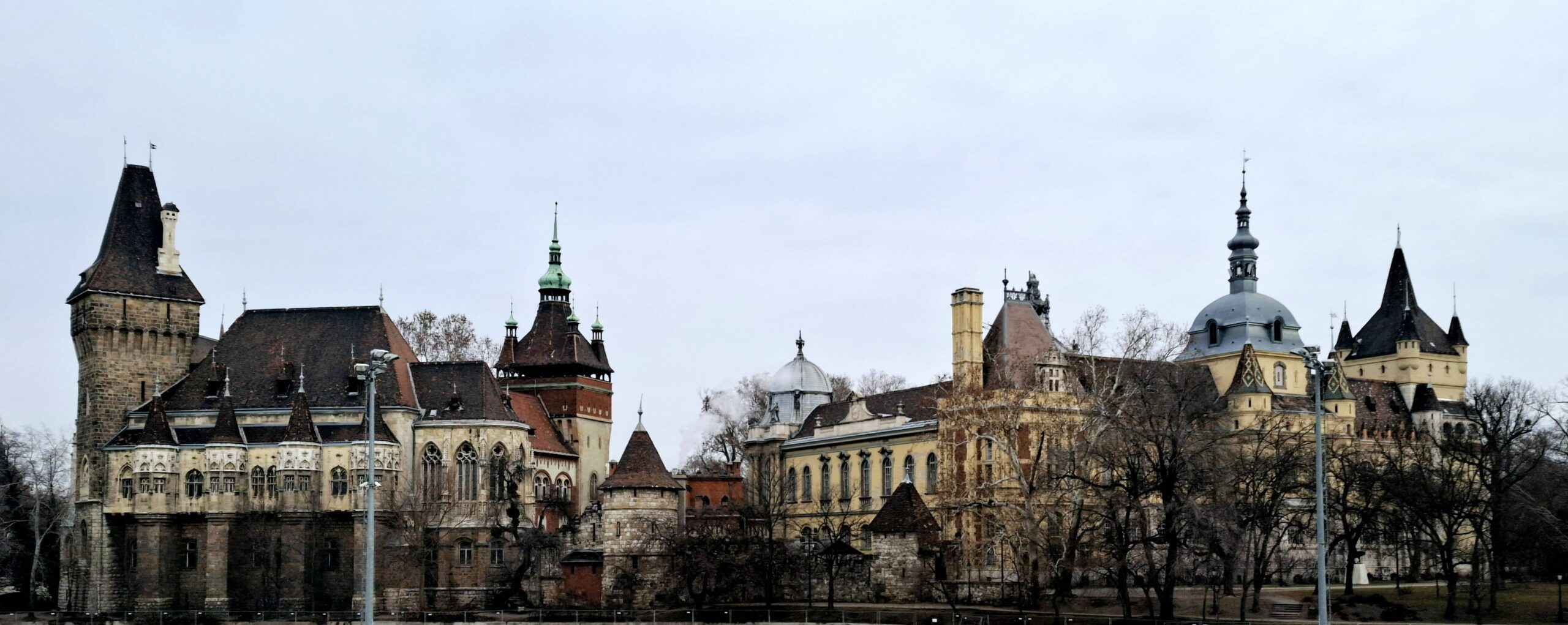 Panoramic view of Vajdahunyad Castle showcasing its mixed architectural styles