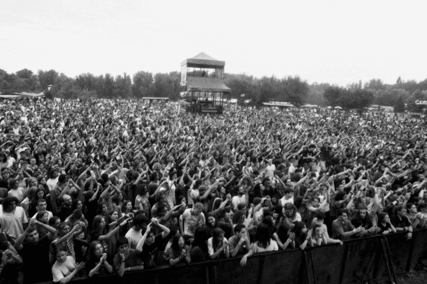 A massive crowd clapping at an early 1990s edition of the Sziget Festival